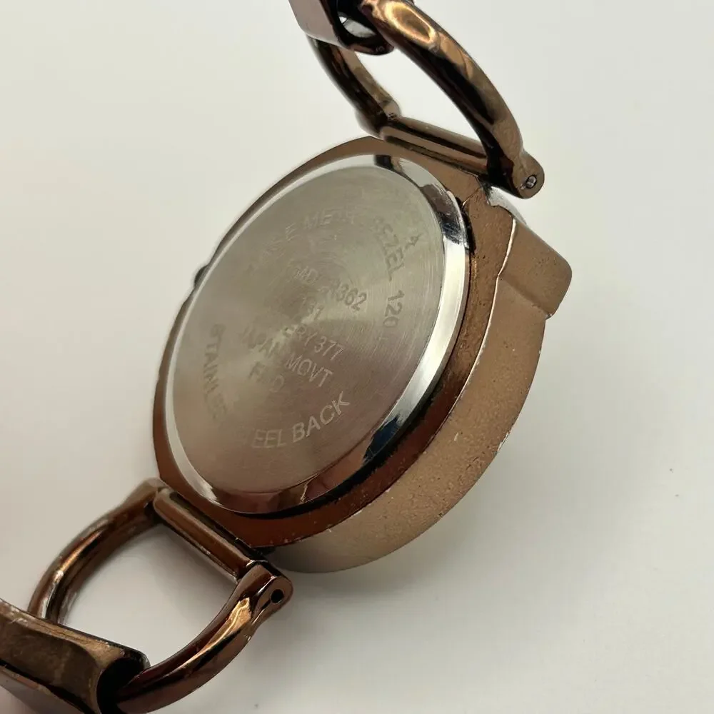 Gold Tone Women Watch Fleur-de-lis Emblem Oversized Arabic Numerals New Battery